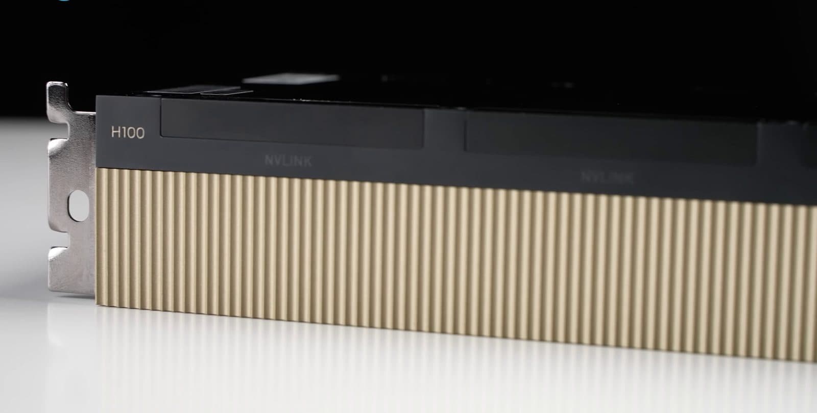Close-up of an NVIDIA H100 SXM module, the first data-centre GPU with FP8 tensor cores