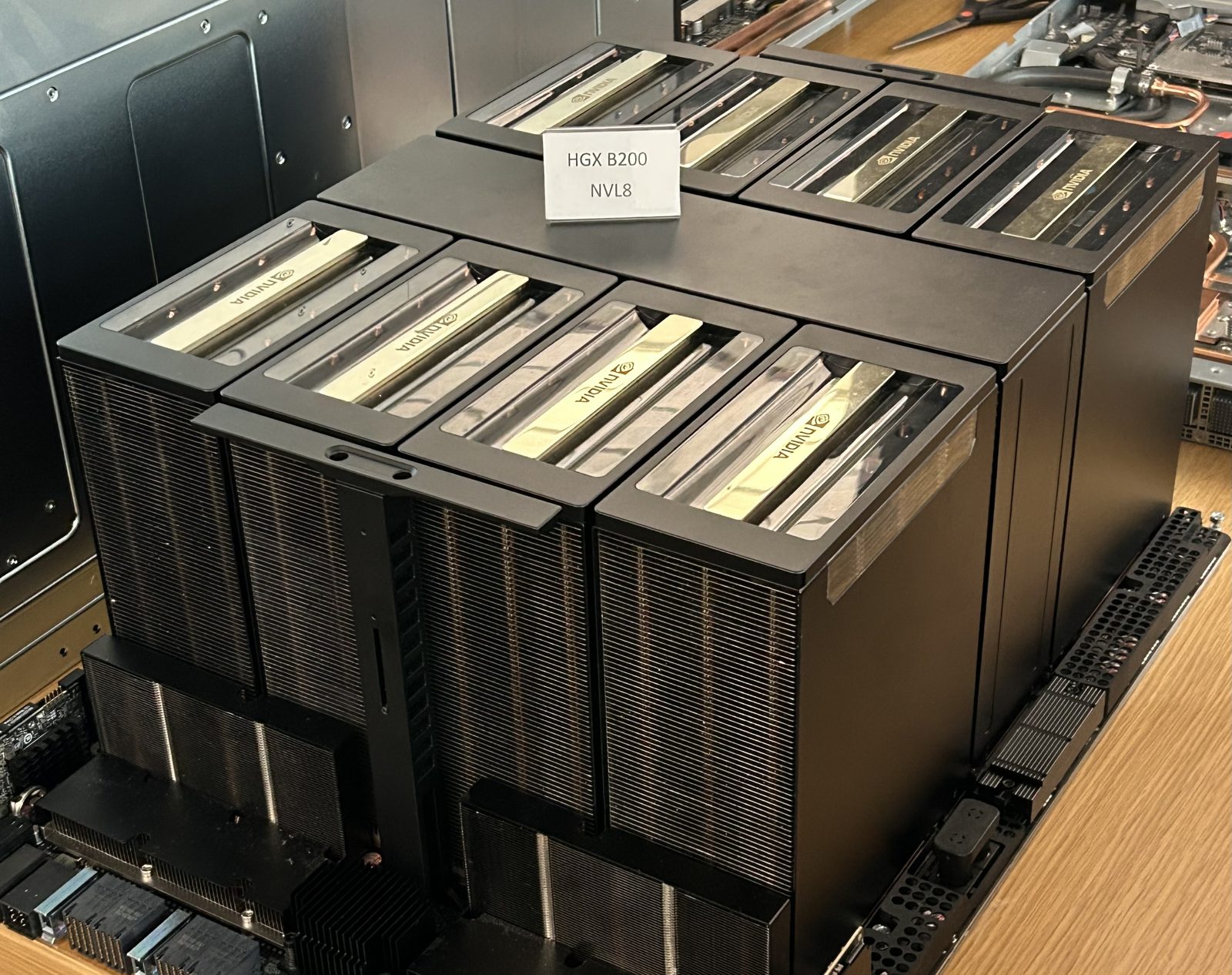 An NVIDIA HGX B200 eight-GPU baseboard with its heat sinks, labelled HGX B200 NVL8